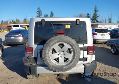 2011 Jeep Wrangler Unlimited Sahara from USA, damaged, VIN 1J4BA5H16BL559354